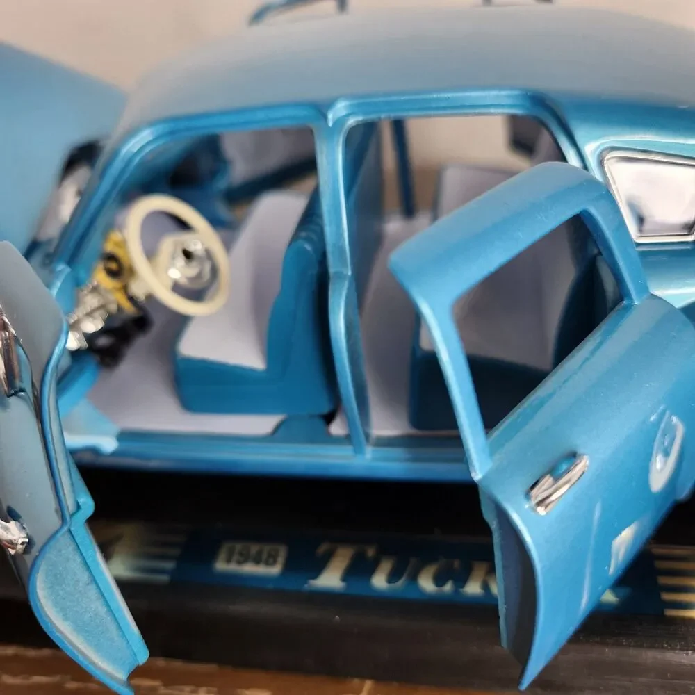 Road Legends 1948 Aqua Blue Tucker 1:18 Diecast Car # 92268 With Box and Stand
